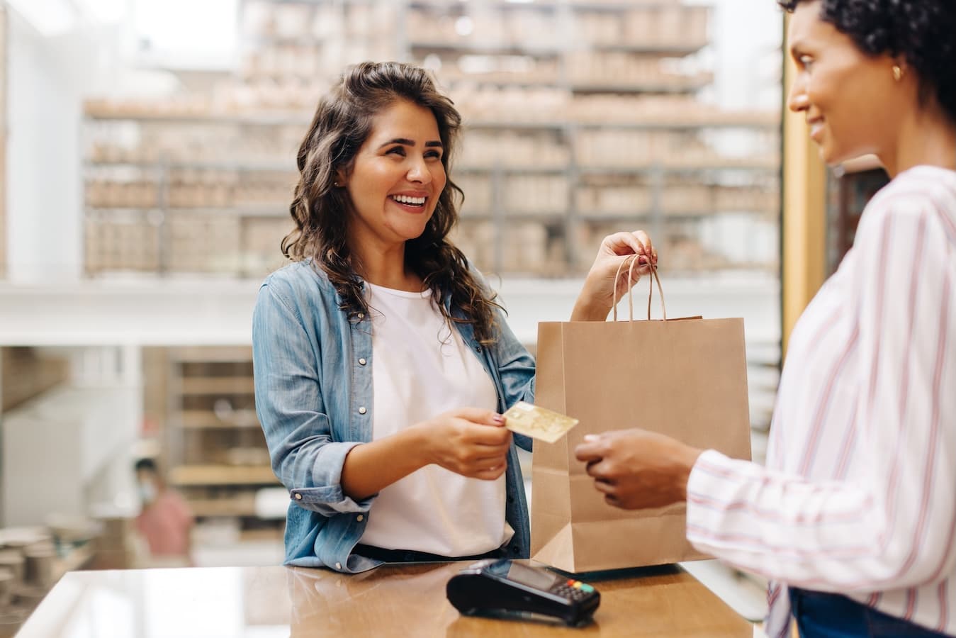 Retail merchant account with POS payment processing at a retail counter
