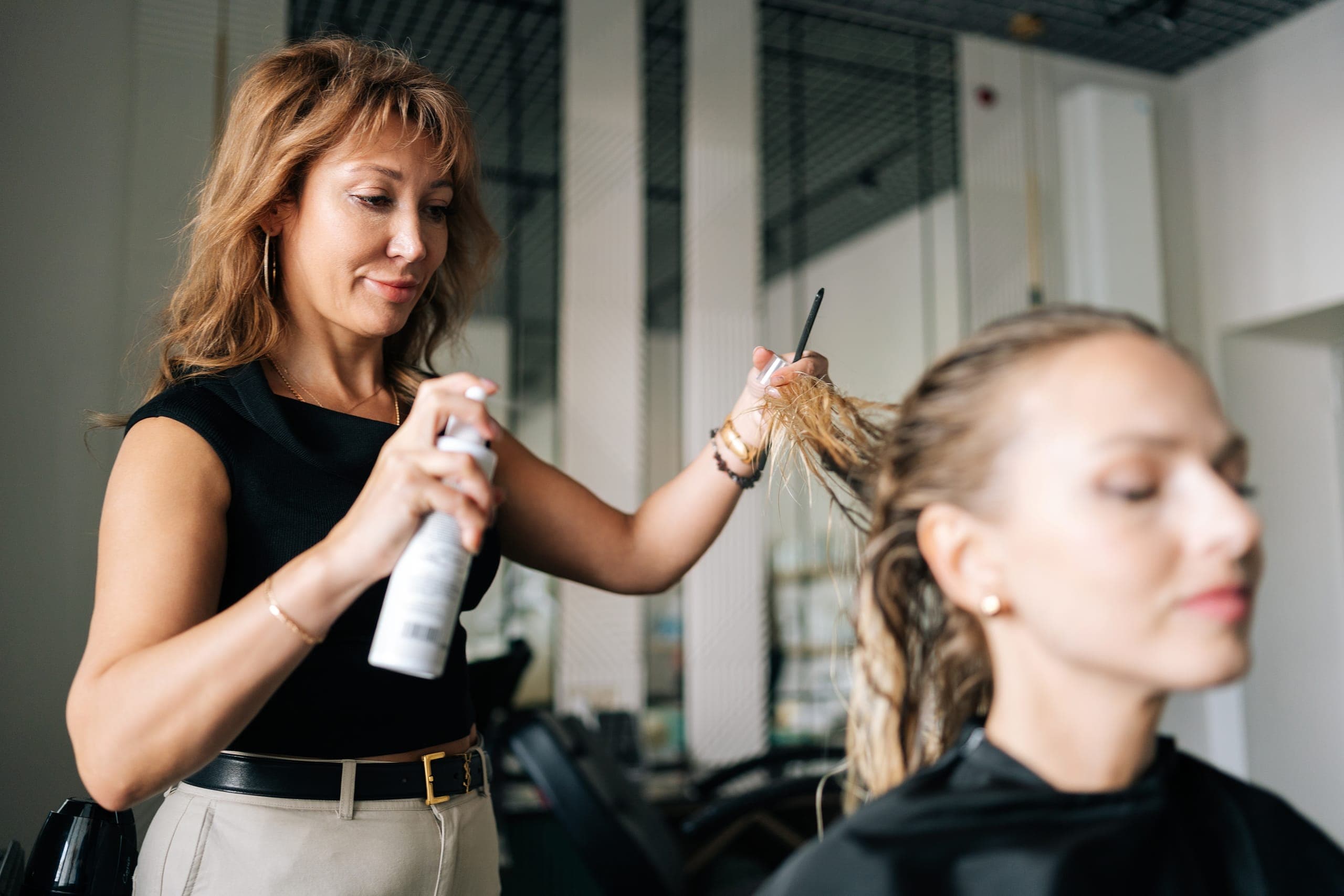 Merchant services for salons supporting a stylist at work