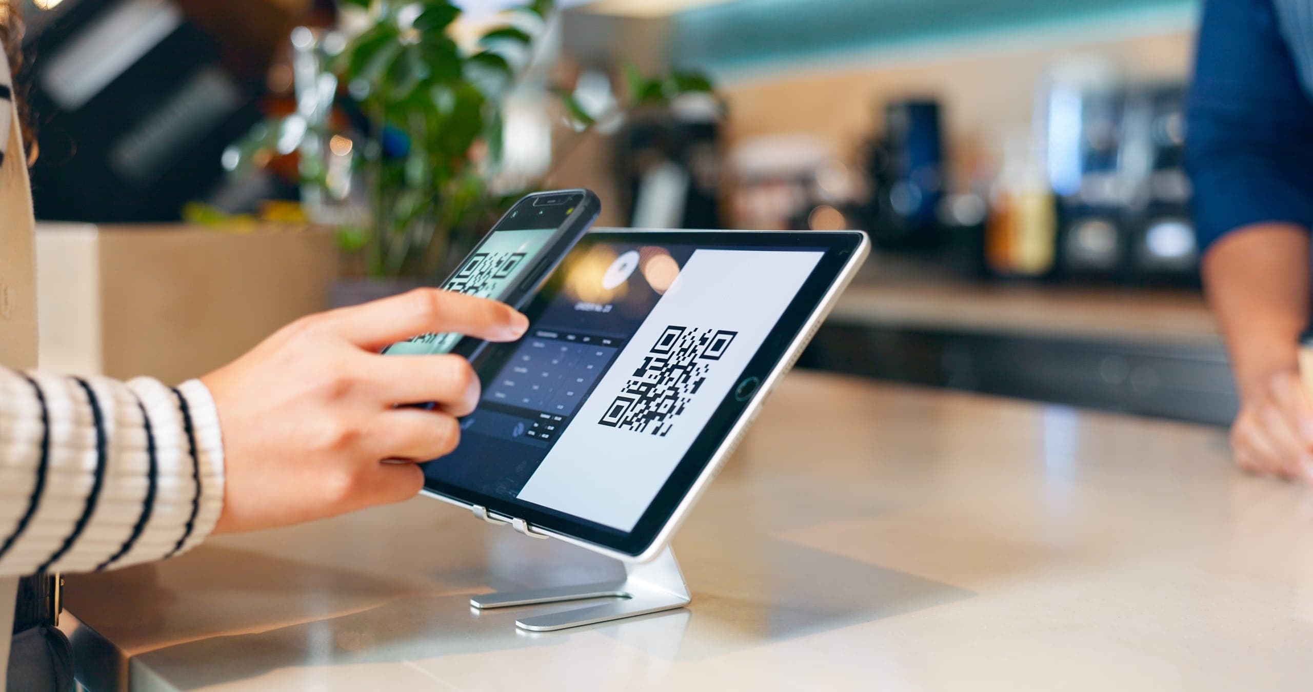 Customer checking out with touchscreen POS system