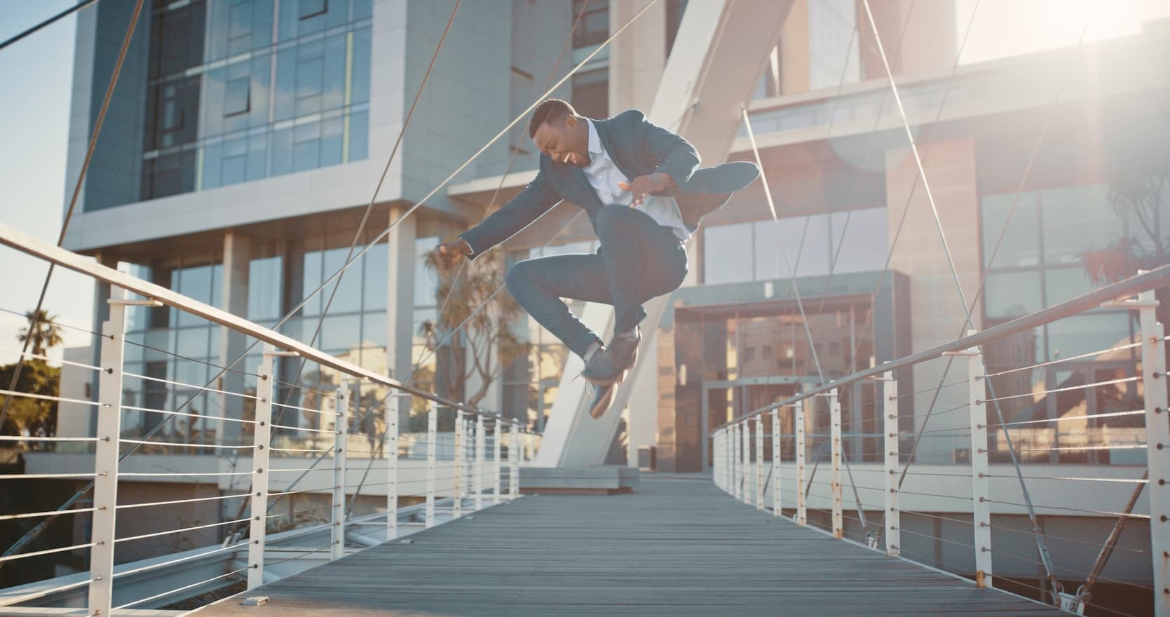 Business owner jumping for joy after a merchant account approval
